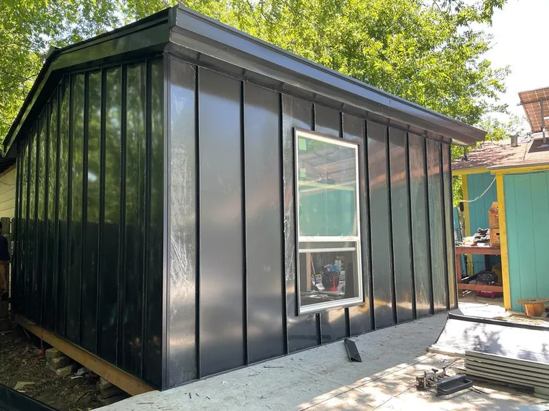 Black standing seam metal wall panels for Roof Inspection in Chandler